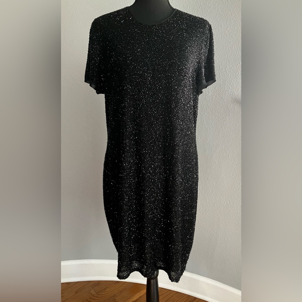 Little black dress! Fully lined, fully embellished with small black beads size L